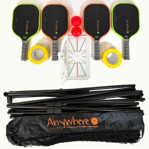 August 1, 2026. Anywhere Pickleball, the brand for Caring Picklers and creator of the Freedom Fighter Paddle, today announced that applications are open for the Anywhere Pickleball Activation Grant (APAG), a new initiative helping schools, parks, senior centers, and community organizations create places to play Flat-lay of the Anywhere Pickleball Activation Kit showing four black Nomado paddles with green and orange edge guards, two red pickleballs, yellow court tape, the Anywhere Protractor template, and a folded portable net with black Anywhere-branded carry b