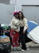 From #1 Bestseller to the Tenderloin: Alexander Debelov and Stefania Leão Give Away Books to San Francisco's Unhoused
