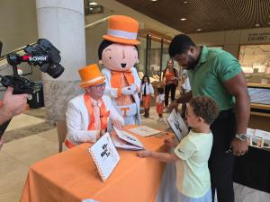 J.R. Greene and Tuxie meet and sign books for fans (photo courtesy JR Greene)
