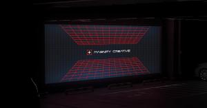 MagnifyTV screen mockup displaying promotional content inside a local business