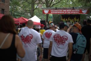 This Sunday, one of the world's most diverse communities will come together to celebrate the people, businesses, and organizations that make Jackson Heights extraordinary Attendees gather near the main stage during Jackson Heights Day, a community celebration in Jackson Heights, Queens.