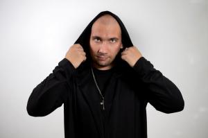 As automated systems and modern technologies increasingly reshape our daily lives, independent producer and rapper Alexander Didenko (performing under the alias SanMinor) has emerged as a representative of a unique musical subgenre that blends dark underground hip-hop with the philosophy of classic science fiction Official press portrait of independent hip-hop artist, songwriter, and producer SanMinor (Alexander Didenko).