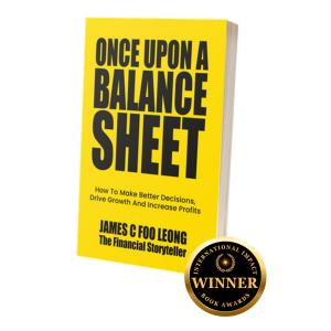 Yellow cover of Once Upon a Balance Sheet by James C Foo Leong, displayed beside an International Impact Book Awards Winner emblem.