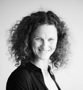 Professional portrait of entrepreneur and youth development expert Lucie Straková smiling