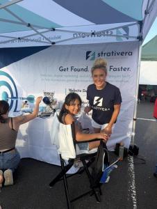 Strativera Co-Founder Janae Tanner at the agency's face-painting station during National Night Out 2026 in Evesham Township