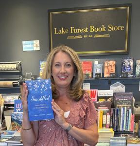 A special moment for author Elizabeth Sarah Cassidy at Lake Forest Book Store in Illinois, celebrating *Swaddled: Sage Stories to Wrap Mothers in Love* on the shelves of this beloved independent bookstore.