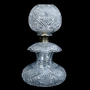 ABCG novelty three-piece lamp that could be transitioned to kerosene with one metal fixture replacement, 21½ inches tall, with hobstar, cane, prism and fan motif. Estimate: $750-$2,000