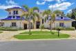 LANG REALTY LISTS BOCA RATON ESTATE FEATURING CUSTOM ROYAL-BLUE ROOF AND 1,500-BOTTLE WINE CELLAR