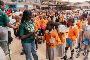 Kids queue to Tap2Eat at Mwiki P