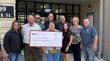 Fisher Barton and Employees Contribute Record-Breaking $19,760 to Local Food Pantries