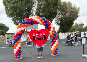 Lovey with the Los Angeles Trial Lawyers' Charities and Orange County Trial Lawyers' Charities at their 10th Annual Great Tryke Giveaway at Bancroft Middle School in Long Beach
