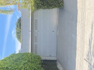 Long-panel sectional garage door emergency repair in Pasadena, CA.