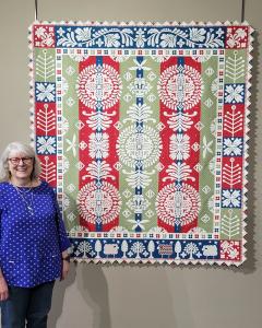 Janet Stone with Quilt