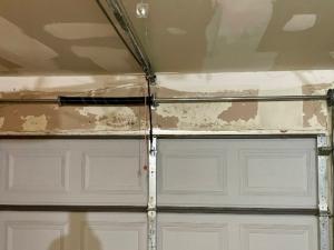 Garage door spring replacement service in Houston, TX.