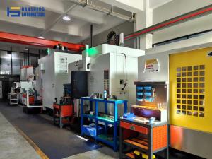 Manufacturing equipment inside Hansheng Automation's facility in Dongguan, China.