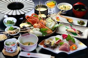 A seasonal seafood dinner course served at Oshima Onsen Hotel.