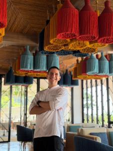 Casa Boho at Hyatt Regency Phuket Resort is pleased to introduce Chef Marcelo Costa as its new chef, bringing a vibrant Latin American culinary spirit to the restaurant’s colourful hillside setting overlooking Kamala Bay Chef Marcelo Costa smiling at Casa Boho in Phuket.