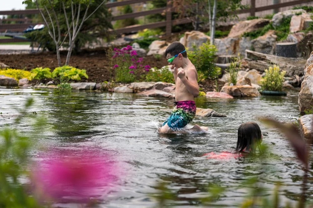 Hiner Outdoor Living Builds Colorado Springs Backyards Around Year-Round Recreational Ponds