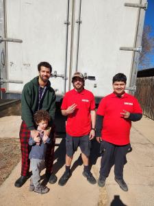 Fatboy Slims Moving Company, a residential and commercial moving firm founded in Colorado Springs, is expanding its full-service moving operations across Colorado's Front Range, extending coverage deeper into the Denver and Fort Collins metropolitan areas Fatboy Slims Moving Company crew in red uniforms in front of a moving truck in Colorado Springs
