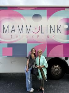 A moment from the 2025 MammoLink event featuring Beila, an Internal Medicine MD Trinity team member, and a patient.
