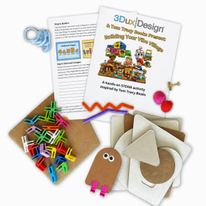 a image of a variety of items included in the 3DuxDesign kit for the Vibe Village, including cardboard cutouts, connectors, yarn, and an instruction guide