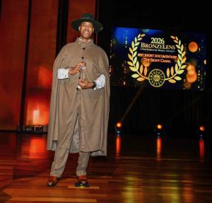 Emmai Alaquiva Receives BronzeLens Award for Best Short Documentary. Photo Credit: Paul Biagui