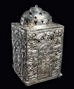 Ecclesiastical silver processional lantern, its sheet-silver walls worked in high repousse and finished with chasing and pierced openwork, with winged cherubs and devotional plaques (Bolivia, circa 1700-1799). Estimate: $30,000-$35,000