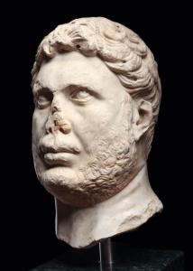 Life-size Roman head carved in white marble, 12¼ inches tall, mounted on a custom dark green marble block base (Imperial period, circa 100-300 CE), previously auctioned at Christie’s NY in 2019. Estimate: $15,000-$25,000