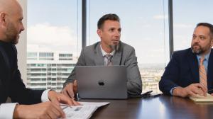 Phillips Law Group announced that 167 attorneys are actively working on the firm’s Arizona personal injury cases during September 2026, reflecting the legal resources available across its Arizona injury practice Phillips Law Group legal team members meeting to discuss a personal injury case in Phoenix, Arizona.