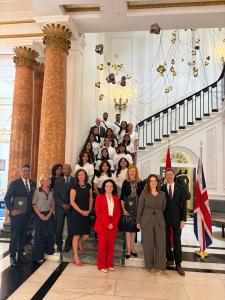 OSCA Ontario Premier’s Team student-athletes and staff posing with Sophia Arvanitis, Ontario’s Agent General, Robert Fry, Canada’s Deputy High Commissioner, and guests at Canada House in London during CAP 2026.