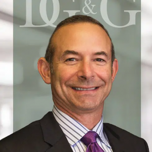 William Green, founding attorney at Delfino Green and Green, wearing a suit
