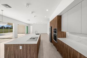 A recently completed luxury kitchen remodel showcasing custom cabinetry and premium finishes
