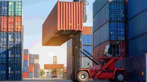 Containers being loaded at port