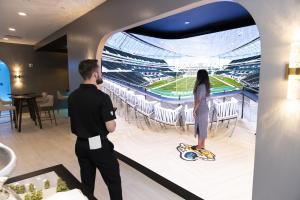 The Immersive Cube anchors the immersive storytelling journey in the center.