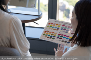 A professional color consultant offers personalized advice to a participant.