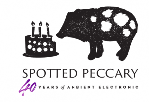 a spotted peccary (pig) with a birthday cake