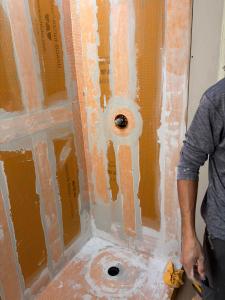 Plumbing Detectives LLC, a licensed plumbing contractor (CFC1434139) serving Venice, Nokomis, Sarasota, and the surrounding Southwest Florida area, is clarifying a common point of confusion for homeowners planning a bathroom remodel: the price difference between a Durock cement board shower with a liquid membrane and one with a Schluter-Kerdi sheet membrane has little to do with material cost — and nothing to do with one system being inferior Kerdi shower waterproofing in Venice FL with banded seams, sealed valve penetration, and Kerdi shower pan before tile installation