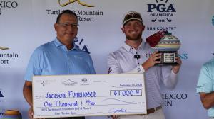 Jackson Funkhouser holds Champion Trophy at 2026 New Mexico Open