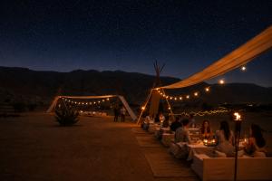 Zerzura Experiences will host Zerzura Sunsets on Saturday, 14 November 2026, at its desert camp in Mleiha National Park, Sharjah Zerzura desert dining setting in Mleiha National Park, Sharjah