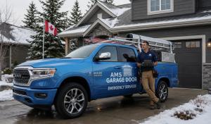 AMS Garage Doors technician standing in front of a service truck in London, Ontario