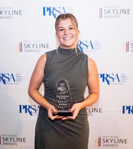 LCPR's Emily Miller accepts PRSA Chicago Young Professional of the Year Award