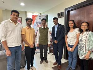Hiten Bhuta with Hindi Divas participants and a Consulate General of India representative in Atlanta