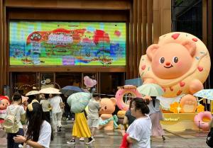 Visitors at a character-themed retail experience in Shanghai