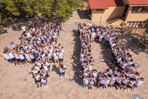 Brian Cooper Dill, founder of TURF ZONE USA, has donated 55 rolls of artificial turf to Colegio Los Cabos,