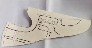 Representative image illustrating paper-pattern development within Joes Footwear’s CAD-to-sample workflow.