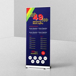 A navy blue retractable banner with a red, yellow, and green diagonal stripe, reading 