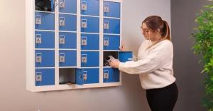 Wall-mounted 20-door mobile phone locker with individual key locks, supplied by Locker Shop UK