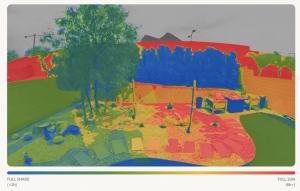 This image of a yard in Nevada with plants, bushes and a large tree is color coded according to how much sun each area received on a summer day. Areas in dark blue indicate full shade, and areas in dark red indicate full sun with other colors in between.
