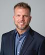 Chris Carson Receives Honorary Doctor of Technology Degree from International American University