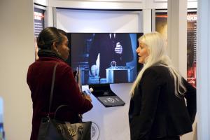 Diplomats touring mental health exhibit.